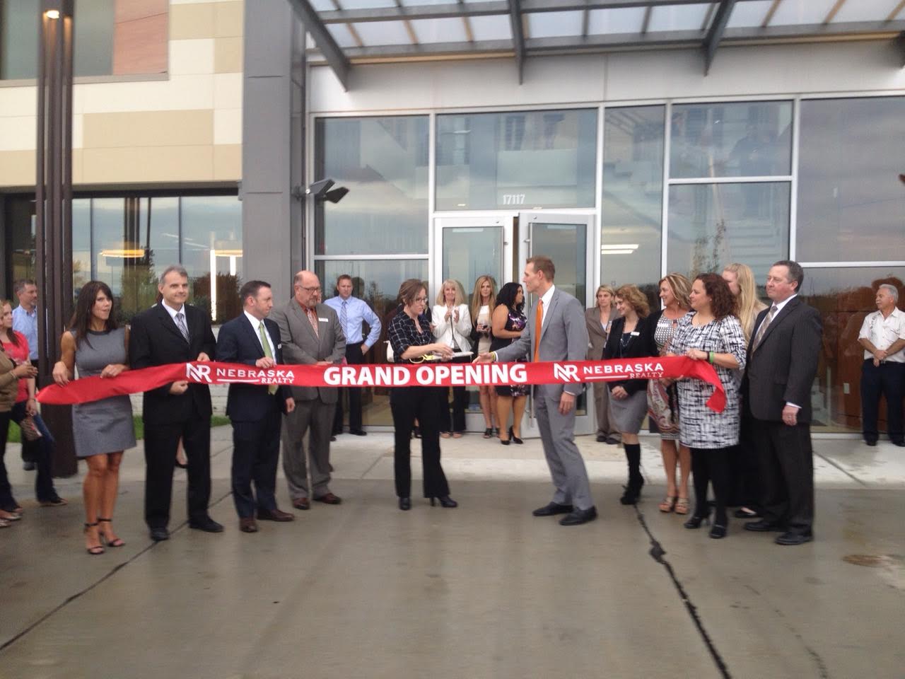 Nebraska Realty Ribbon Cutting Ceremony - Corporate Three Design